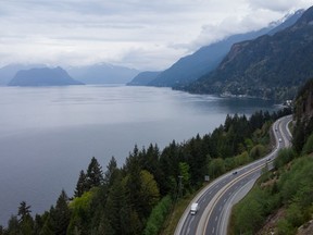 Motorists travel on the Sea-to-Sky highway between Horseshoe Bay and Lions Bay, B.C., on Friday, April 23, 2021. Unifor, the union representing transit workers in B.C.'s Sea-to-Sky region, says members have rejected a tentative agreement that had been signed by their bargaining committee after mediated negotiations with their employer.
