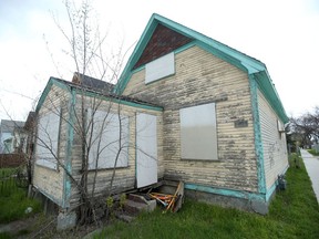 The remains of eight dogs were discovered in this boarded up home in the 1400 block of Ross Ave West in Winnipeg. The incident is now described an an animal cruelty investigation Winnipeg Police said Saturday.