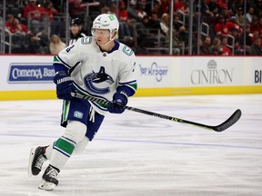Defenceman Jack Rathbone will make his season debut for the Vancouver Canucks tonight in their home opener.