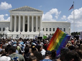 Abortion rights activists fill the street in front of the U.S. Supreme Court during a protest in the wake of the decision overturning Roe v. Wade.