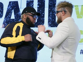 Comedian Drew "Druski" Desbordes (L) as "Coach D" and Jake Paul pose during a news conference to promote Paul's Showtime pay-per-view boxing event against Tommy Fury at Resorts World Las Vegas on November 6, 2021 in Las Vegas, Nevada. Paul will face Fury in an eight-round cruiserweight bout, at a 192-pound catchweight, at Amalie Arena in Tampa, Florida on December 18.