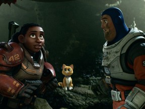 Izzy (Keke Palmer), Buzz (Chris Evans) and the scene-stealing SOX (Petre Sohn) in Lightyear.