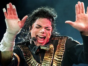 In this file photo taken on Aug. 31, 1993, pop megastar Michael Jackson performs during his "Dangerous" tour in Singapore.