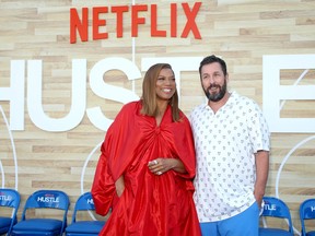 Queen Latifah and Adam Sandler attend the Netflix premiere of "Hustle" at Regency Village Theatre on June 1, 2022 in Los Angeles, Calif.