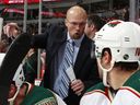  Mike Yeo, the coach of the Minnesota Wild, talks to Devon Setoguchi #10 during their NHL game against the Vancouver Canucks at Rogers Arena October 22, 2011.
