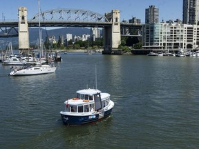 Ferries carry passengers to and from Granville Island Friday, June 24, 2022.