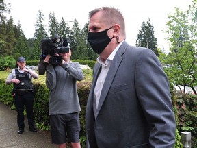 Former Whitecaps women’s coach Bob Birarda arrives at North Vancouver courthouse for a sentencing hearing on June 8, 2022.
