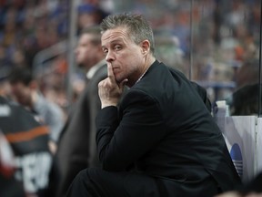 Then-Buffalo Bandits head coach Troy Cordingley strikes a pensive pose during a 2018 National Lacrosse League game in Buffalo, N.Y.