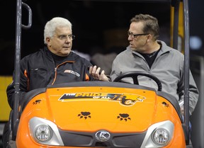 Province columnist Ed Willes (right) puts B.C. Lions head coach Wally Buono on the spot in an interview at B.C. Place Stadium in November 2011, the month in which the Lions won the most recent of their six Grey Cup championships.