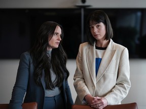 Cheyenne Stonechild, right, lead representative plaintiff, stands with lawyer Angela Bespflug after a news conference in Vancouver, on Monday, June 20, 2022.