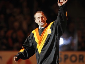 2008. Trevor Linden long time Vancouver Canuck had his uniform retired. Here former Captain Stan Smyl waving to fans.
