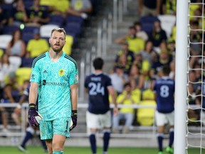The Whitecaps staved off defeat with Javain Brown's 87th minute equalizer against Nashville SC's goalkeeper Joe Willis in a 1-1 tie at Geodis Park July 30, 2022. Getty Images