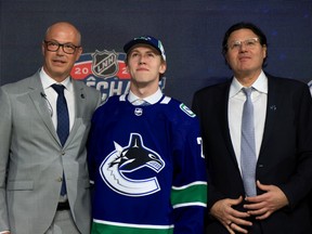 Jonathan Lekkerimaki is drafted by the Vancouver Canucks during Round One of the 2022 Upper Deck NHL Draft at Bell Centre on July 07, 2022 in Montreal, Quebec, Canada.
