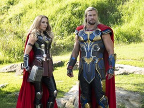 Natalie Portman as Mighty Thor and Chris Hemsworth as Thor in Marvel Studios' Thor: Love and Thunder.