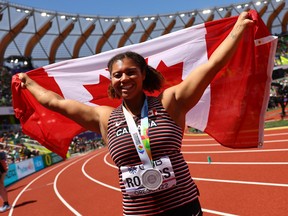 Silver medallist Camryn Rogers celebrates after the women's hammer throw final.