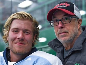Vancouver Canucks winger Brock Boeser with his father Duke.