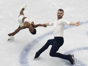 Vanessa James and Eric Radford of Canada perform in the pairs short program at the Figure Skating World Championships in Montpellier, south of France, Wednesday, March 23, 2022. THE CANSADIAN PRESS/AP/Francisco Seco