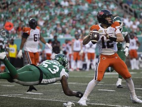 Saskatchewan Roughriders linebacker Darnell Sankey (53) goes to table BC Lions quarterback Nathan Rourke (12) during the first half of CFL action at Mosaic Stadium on Friday, July 29, 2022 in Regina.