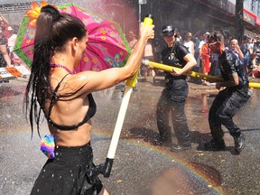 Action scenes from the Pride Parade on Denman St. in Vancouver, BC., on July 31, 2022.