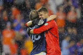 Vancouver Whitecaps goalkeeper Isaac Boehmer (right) reacts with midfielder Florian Jungwirth (26) after the draw against FC Cincinnati at TQL Stadium last week.