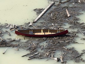 A aerial view shows a canoe among the damage caused by a tailings pond breach near the town of Likely, B.C., in August, 2014.