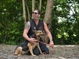 Jeffrey Beri, founder of No Dogs Left Behind, pets Papo, who arrived in Canada on June 24, at his sanctuary in Toronto, on Wednesday, June 29, 2022. Papo who was too young to transport earlier this year, was one the last 10 of the mixed-breed street dogs from Afghanistan to have arrived at the sanctuary.