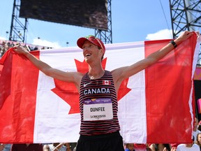 Canada's Evan Dunfee celebrates winning the gold medal in the Men's 10,000m Race Walk Final on Day 10 of the Birmingham 2022 Commonwealth Games at Alexander Stadium on Aug. 7, 2022.