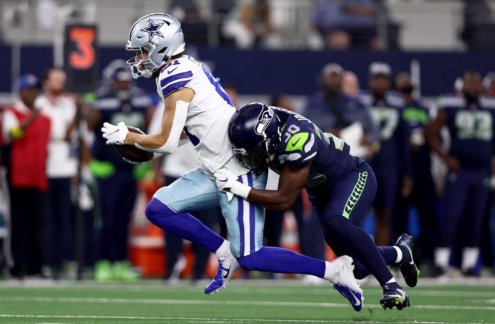 ARLINGTON, TX - AUGUST 26: Dallas Cowboys cornerback Nahshon Wright (25)  runs back for yardage after an interception during the game between the  Dallas Cowboys and the Seattle Seahawks on August 26