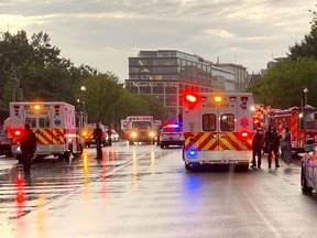 In this photo provided by @dcfireems, emergency medical crews are staged on Pennsylvania Avenue between the White House and Lafayette Park, Thursday evening, Aug. 4, 2022 in Washington.