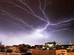 File photo: Lightning brightens the night sky over Washington, DC, during a rainstorm on April 20, 2015.