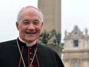 Canadian cardinal Marc Ouellet walks on St Peter's square after a meeting on the second day of pre-conclave on March 5, 2013 at the Vatican.