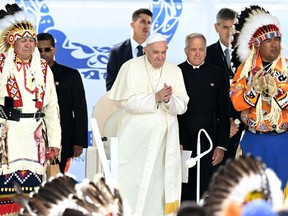 Many residential-school survivors and others expressed respect to the pope for bringing his apology to North America. Another cohort of Canadians were decidedly unimpressed, though. What's the future of reconciliation now? (Pope Francis speaks to members of the Indigenous community at Muskwa Park in Maskwacis, Alberta, Canada, on July 25, 2022.)