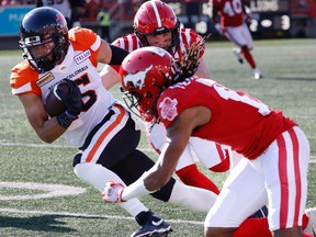 BC Lions Bruce Anderson runs the ball against the Calgary Stampeders during CFL football in Calgary on Saturday, August 13, 2022.