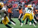 B.C. Lions quarterback Nathan Rourke (12) passes during the first half of CFL football game against the Edmonton Elks in Vancouver, on Saturday, August 6, 2022.