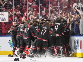Canada celebrates the win over Finland during overtime IIHF World Junior Hockey Championship gold medal game action in Edmonton on Saturday August 20, 2022.
