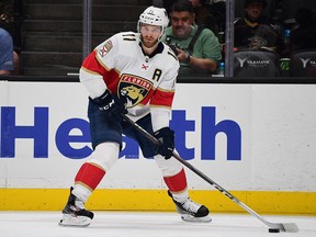 Forward Jonathan Huberdeau controls the puck against the Anaheim Ducks at Honda Center in Anaheim, Calif., on March 18, 2022.