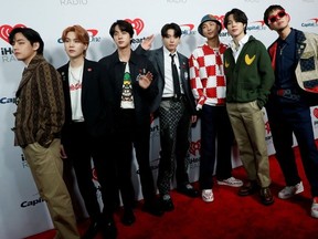 BTS poses at the carpet during arrivals ahead of iHeartRadio Jingle Ball concert at The Forum, in Inglewood, California, U.S., December 3, 2021.