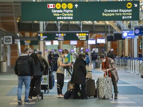 FILE PHOTO of travellers at YVR. Some international students arriving soon to Metro Vancouver still don't have a place to stay.