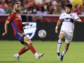 Real Salt Lake's Justin Meram (left) and the Whitecaps' Ryan Raposo will get reacquainted when the two clubs start their MLS regular seasons at B.C. Place Stadium on Feb. 25.