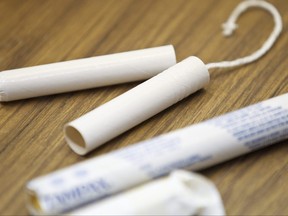 Tampons in cardboard applicators are seen pictured in a file photo.