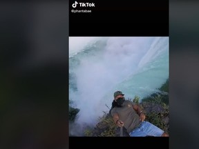 TikTok daredevil Phantabae filmed himself hanging over the edge of the Horseshoe Falls last week in a vertigo-inducing video that conveys the power of the water and shows the immense drop immediately below him.