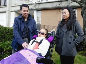 Leila Bui with parents Kairry Nguyen and Tuan Bui in January 2020, after Tenessa Nikirk (not in photo) was found guilty in the Saanich crash. ADRIAN LAM, TIMES COLONIST