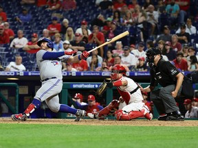 Alejandro Kirk #30 of the Toronto Blue Jays hits a single during the ninth inning against the Philadelphia Phillies at Citizens Bank Park on September 20, 2022 in Philadelphia, Pennsylvania.