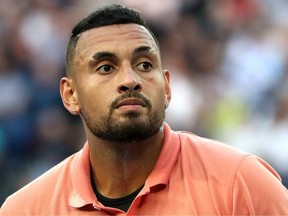 FILE - Nick Kyrgios of Australia looks on prior to his Men's Singles fourth round match against Rafael Nadal of Spain on day eight of the 2020 Australian Open at Melbourne Park on January 27, 2020 in Melbourne, Australia.