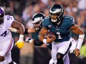 Eagles quarterback Jalen Hurts carries the ball during second quarter NFL action against the Vikings at Lincoln Financial Field in Philadelphia, Monday, Sept. 19, 2022.