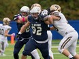 UBC defensive tackle Kyle Samson breaks through the Manitoba Bisons line during a U Sports game last year. T-Birds head coach Blake Nill expects Samson to have a breakthrough season and believes ‘he has a chance to come out of the shadows of other linemen from across the country.’