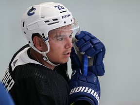 Vancouver Canucks defenseman Brady Keeper looks on during the NHL hockey team's training camp in Whistler, BC, on Thursday, Sept. 22, 2022.