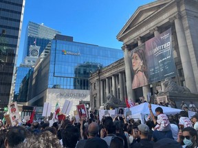 Demonstrators gathered at the Vancouver Art Gallery on Sunday in solidarity with the Iranian people in their protest against the Islamic Republic Regime after the death of 22-year-old Mahsa Amini