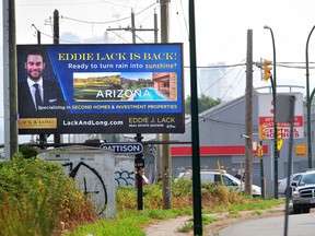 Former Vancouver Canucks goalie Eddie Lack is selling real estate in Arizona and has put up a billboard on Grandview Highway between the SkyTrain station and the Italian Cultural Centre to attract buyers.