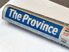 VANCOUVER, BC.: NOVEMBER 14, 2012 -  Province newspaper rolled up in Vancouver, B.C., November 14, 2012.   (Arlen Redekop photo/ PNG)   (For story by [Fabian Dawson])